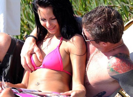 Here is Jessica Jane Clement in Cyprus in hot pink bikini with some punk who