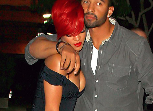 Here is Rihanna looking very leggy in her slutty little dress as her tits Here is Rihanna looking very leggy in her slutty little dress as her tits