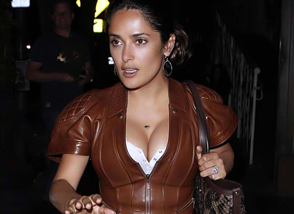 Here is my favorite Latina momy Salma Hayek out somewhere shows her pushed 