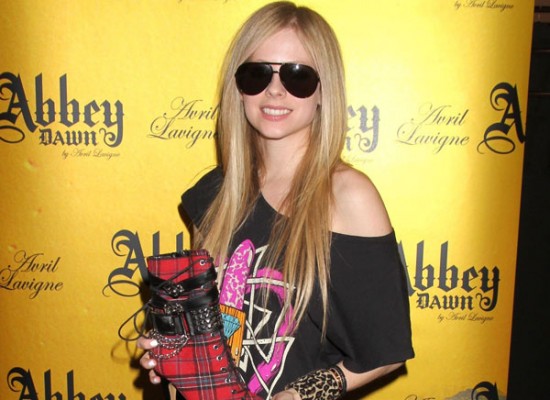 It looks like my dream of seeing Avril Lavigne dress like a real woman has