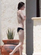 Milla Jovovich topless bikini