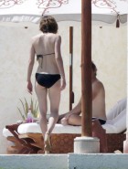Milla Jovovich topless bikini