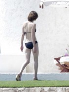 Milla Jovovich topless bikini