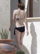 Milla Jovovich topless bikini