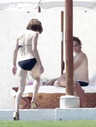 Milla Jovovich topless bikini