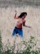 Rihanna topless filming music video