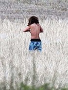 Rihanna topless filming music video