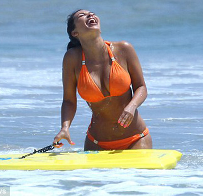 Kim Kardashian orange bikini