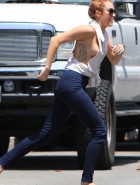Miley Cyrus boobs pop out