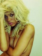 Rihanna topless covered