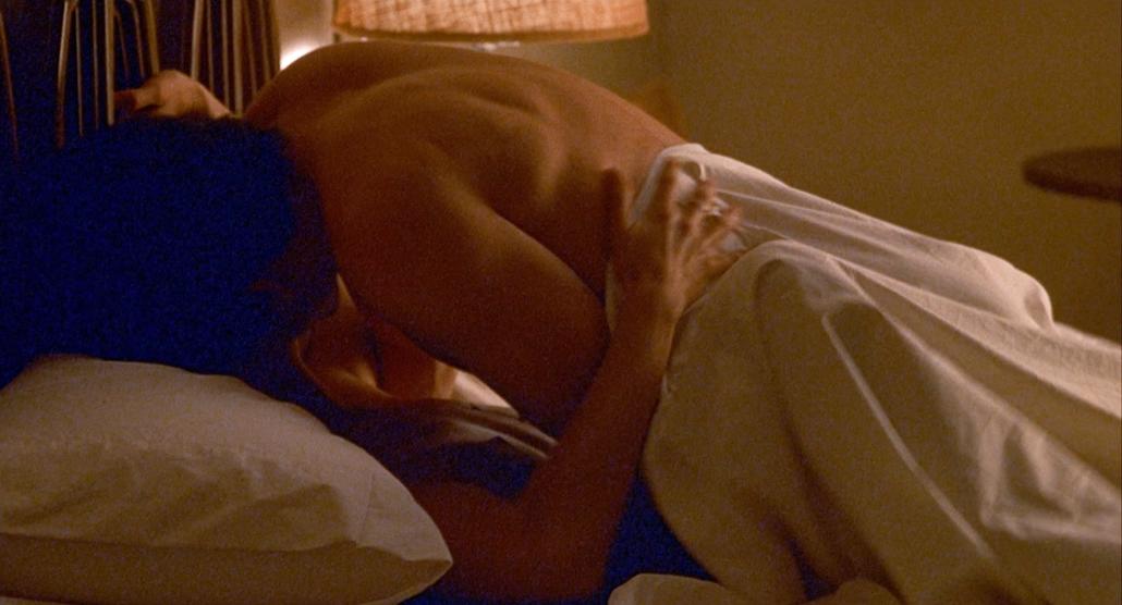Jennifer Aniston and Jake Gyllenhaal in bed in the motel scene from The Good Girl (2002)