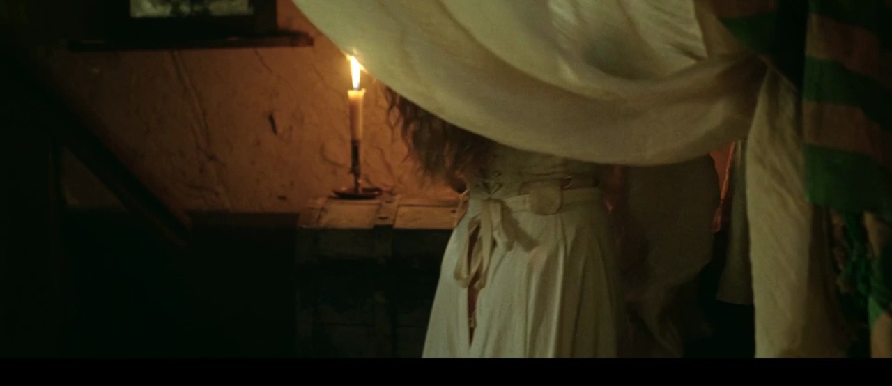 Amanda Seyfried in the candlelit bedroom, The Testament of Ann Lee (2025)