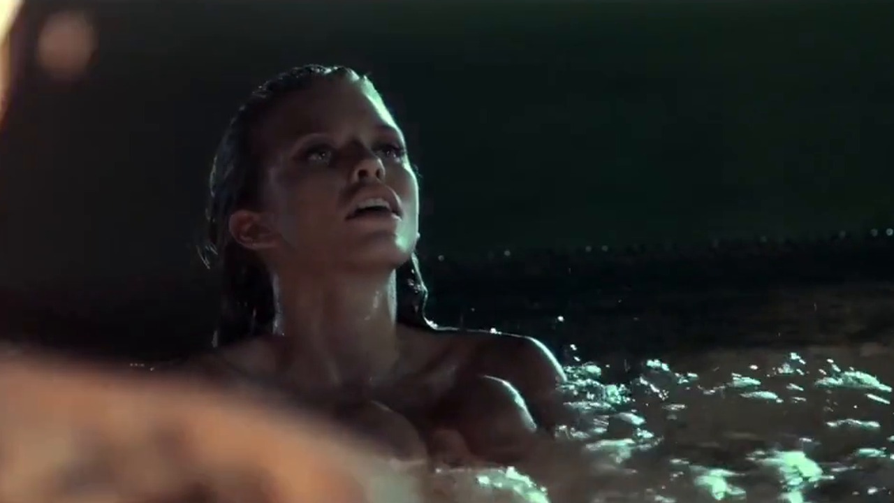 AnnaLynne McCord as May swimming at night in Gutshot Straight (2014)