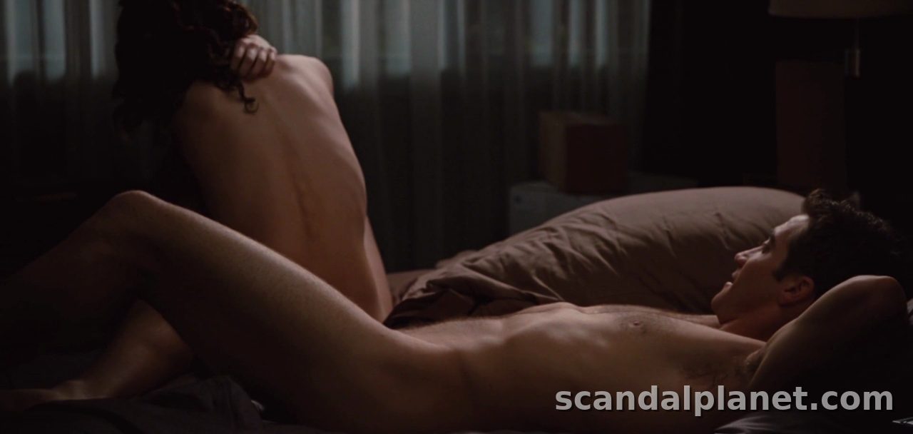 Anne Hathaway sitting up topless in the dark bedroom, Love & Other Drugs