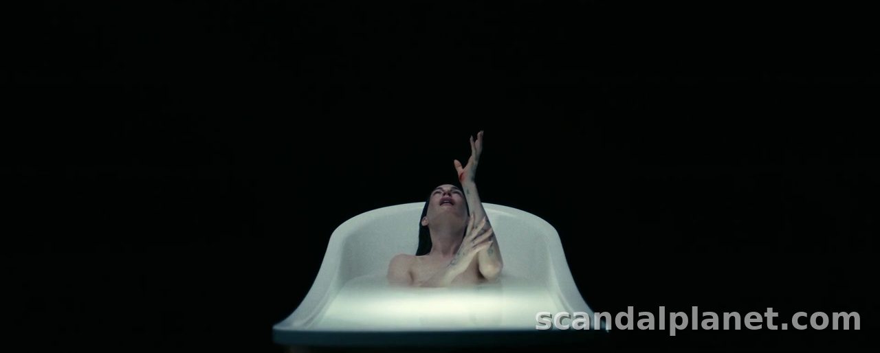 Anne Hathaway raising a hand from the bath, Mother Mary