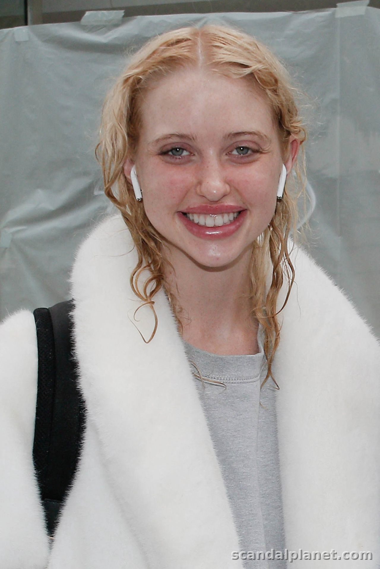 Chloe Cherry smiling at Paris Fashion Week, June 2022