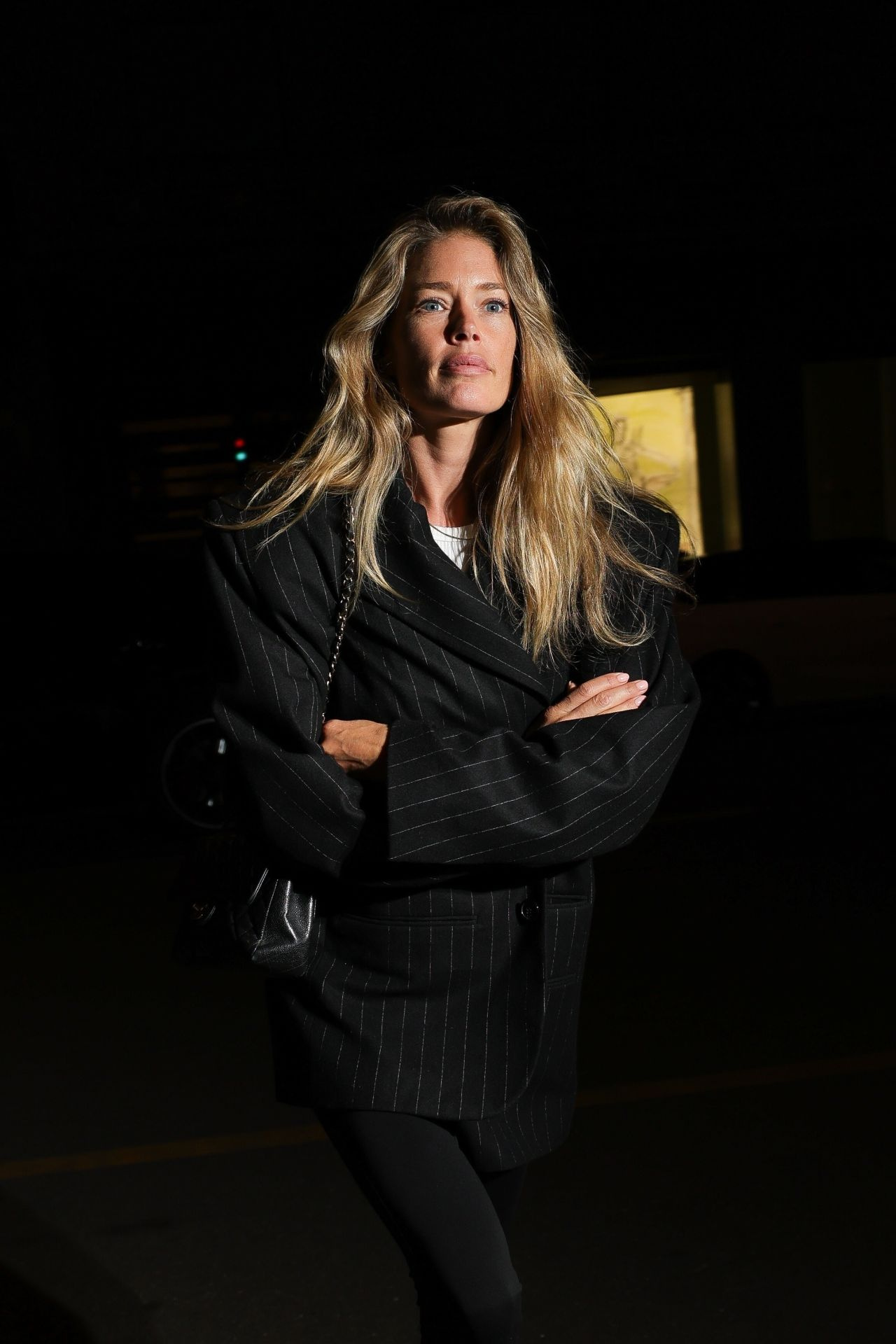 Doutzen Kroes side profile in eveningwear after Milan Fashion Week 2024