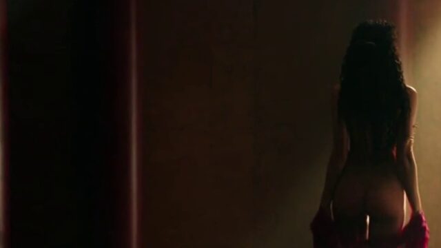 Irina Shayk as Megara in silhouette, back to the camera, in the undressing scene from Hercules (2014)