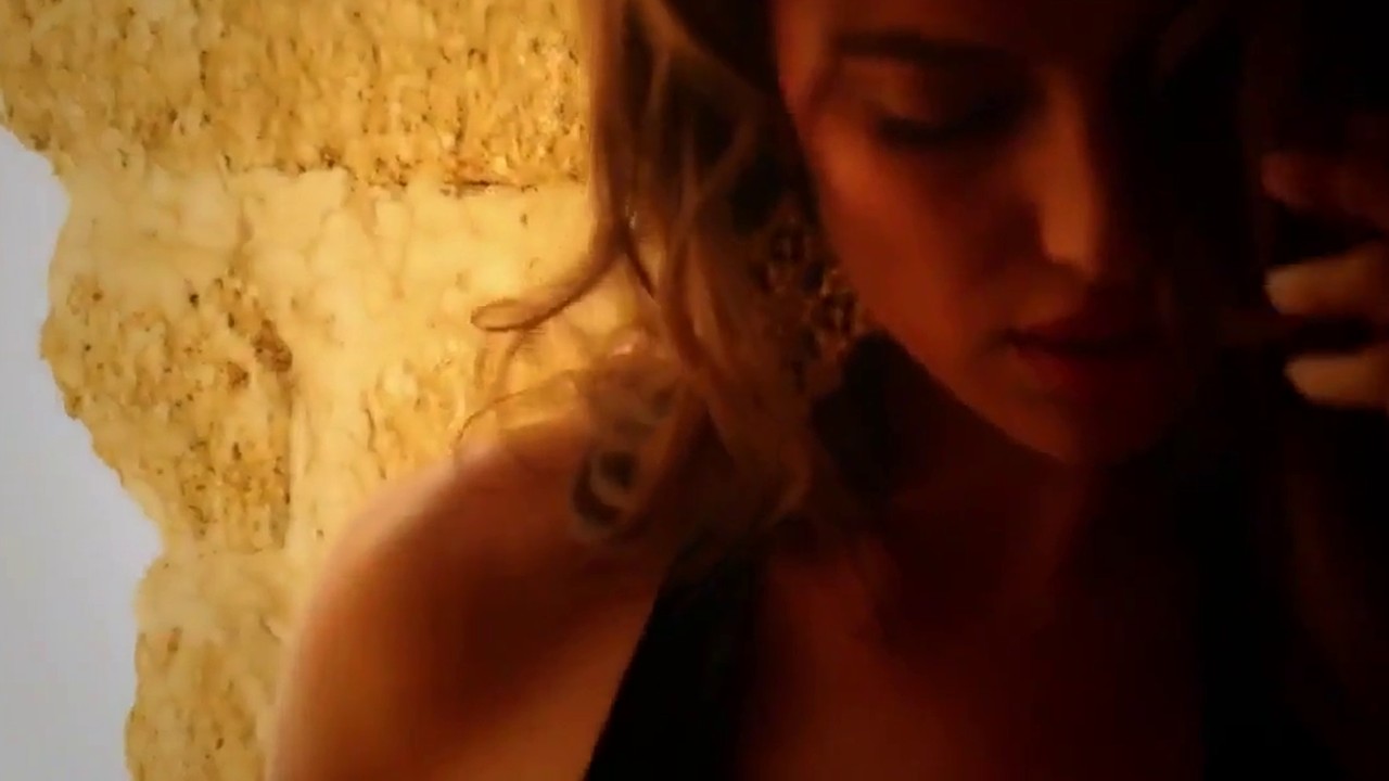 Irina Shayk against sandstone rocks in the Sports Illustrated Swimsuit 2013 video