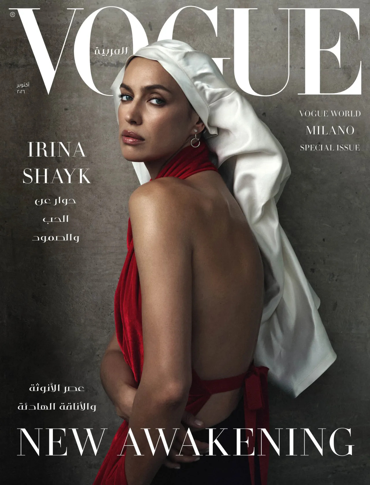 Irina Shayk full-length in black Prada jacket, waistcoat and wide trousers for Vogue Arabia October 2026