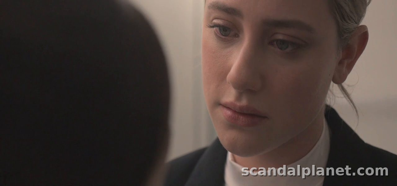 Lili Reinhart as Harper in a black suit, Hal & Harper S1E8