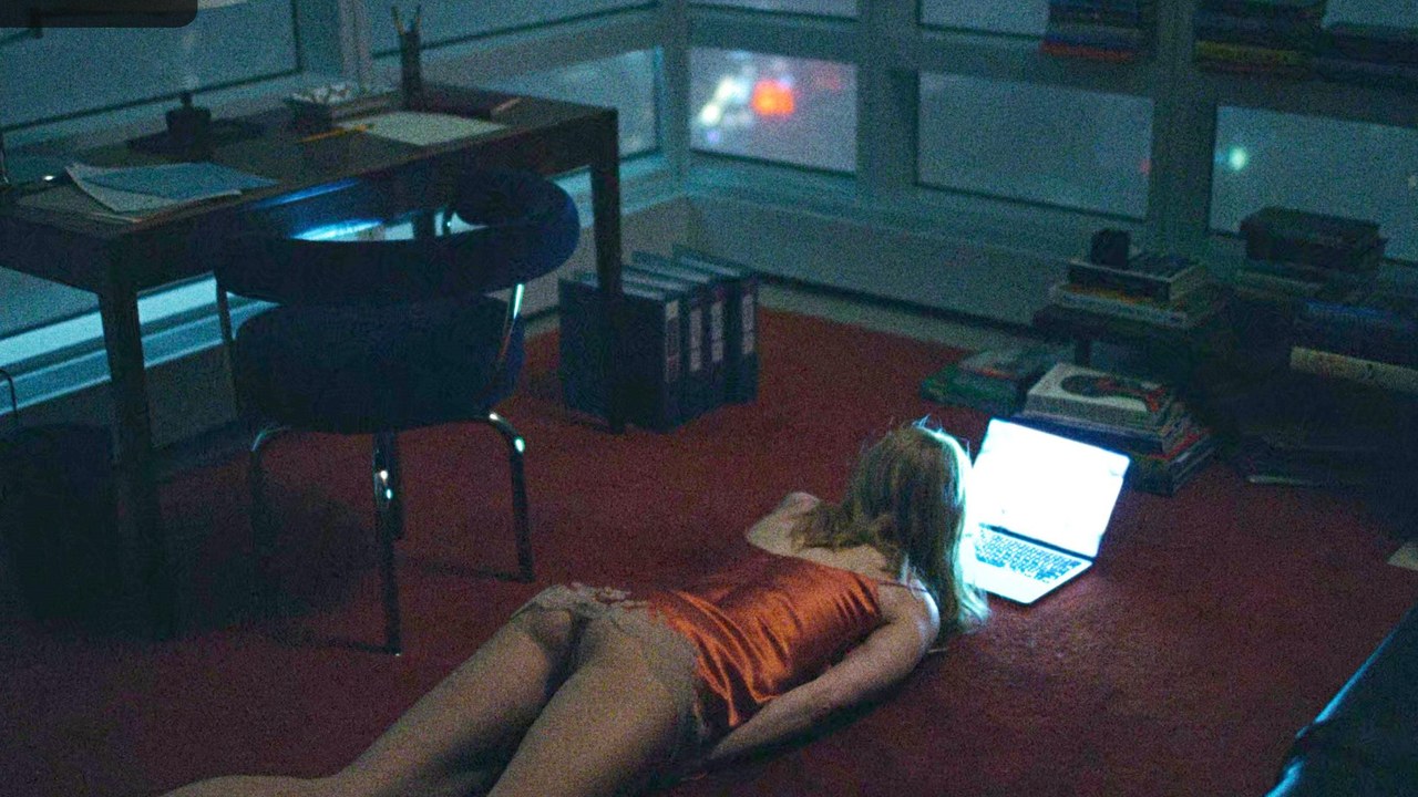 Nicole Kidman on the floor with a laptop, Babygirl (2024)