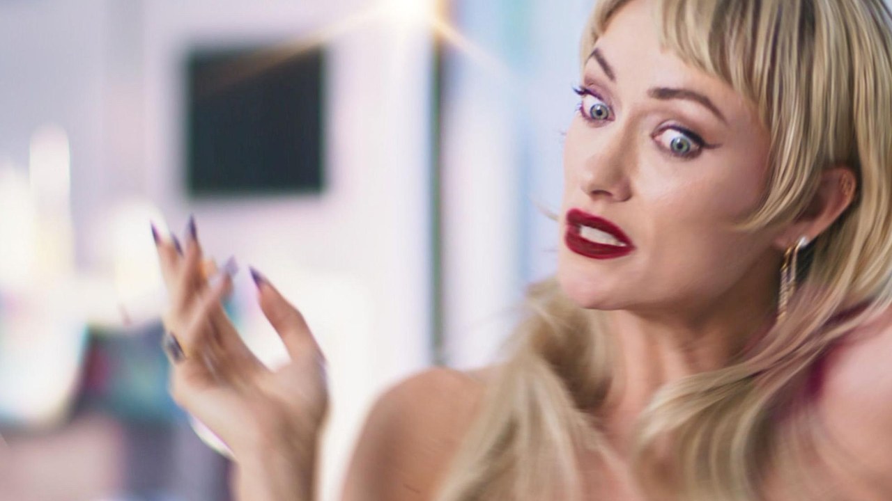 Olivia Wilde as Erika Tracy, topless, in I Want Your Sex (2026)