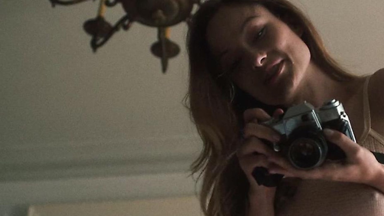 Olivia Wilde as Devon Finestra with a camera, Vinyl (2016)