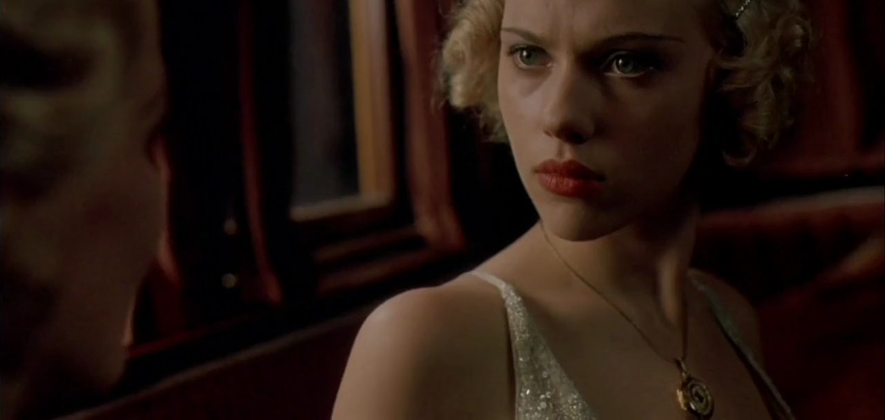 Meg Windermere in her evening gown, A Good Woman