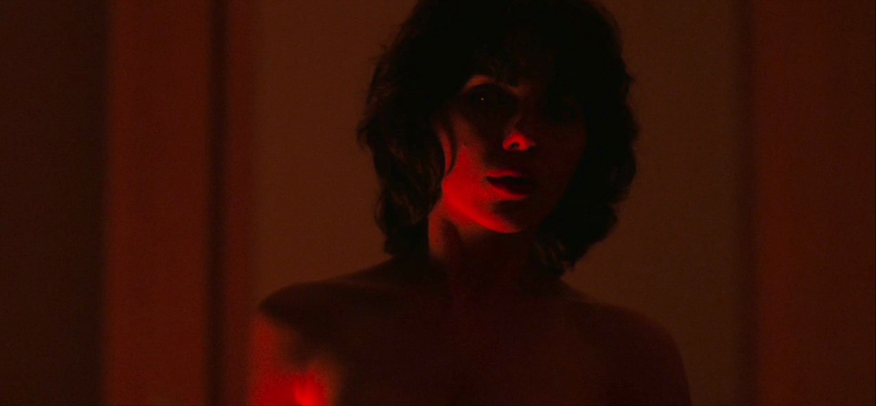 Scarlett Johansson as the Female in the red-lit room, Under the Skin (2013)