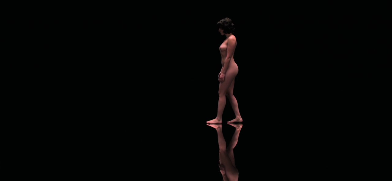 Scarlett Johansson in the void, reflected in the floor, Under the Skin