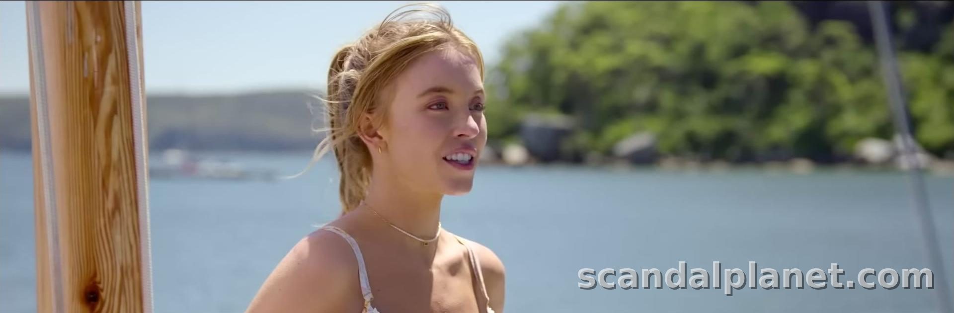 Sydney Sweeney in a bikini top by the water, Anyone But You