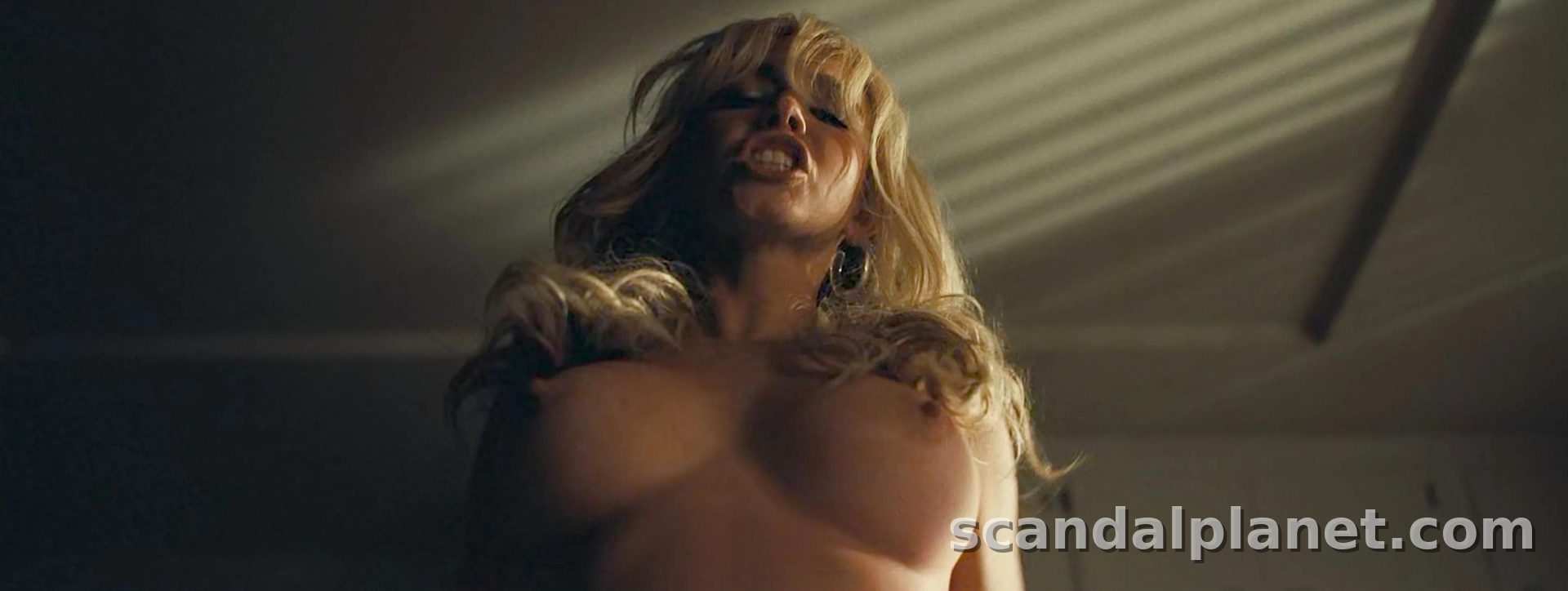 Sydney Sweeney as Cassie in Euphoria season 3, topless in the sunlit bedroom