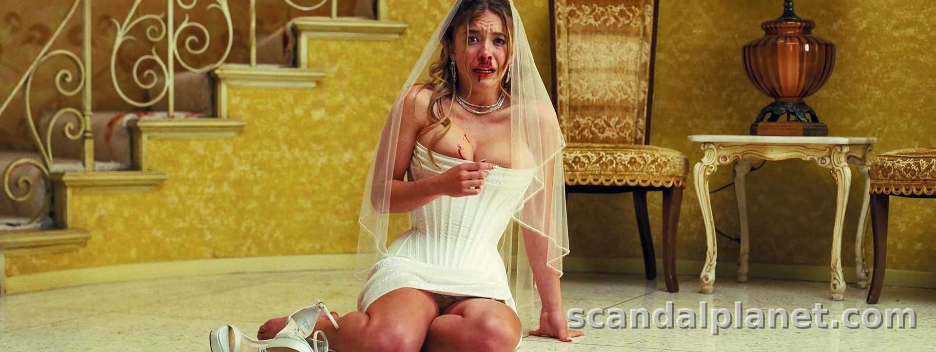 Sydney Sweeney as Cassie in Euphoria season 3, in her wedding dress on the floor