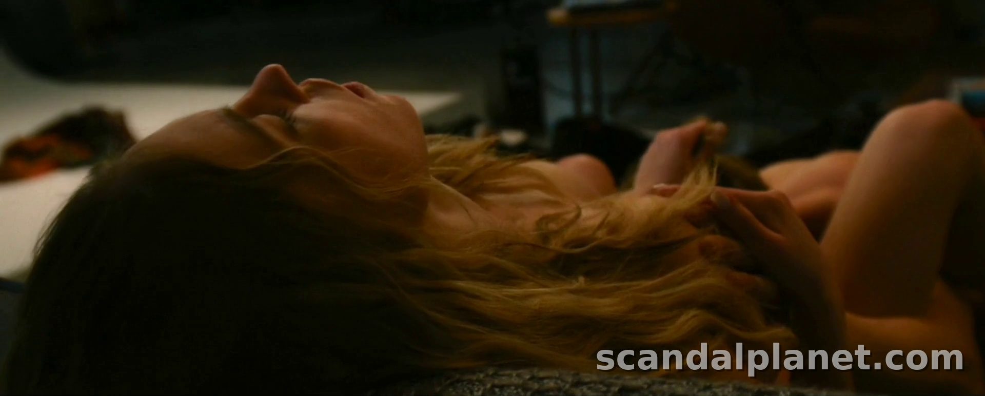 Sydney Sweeney lying back in Seb’s apartment, The Voyeurs (2021)