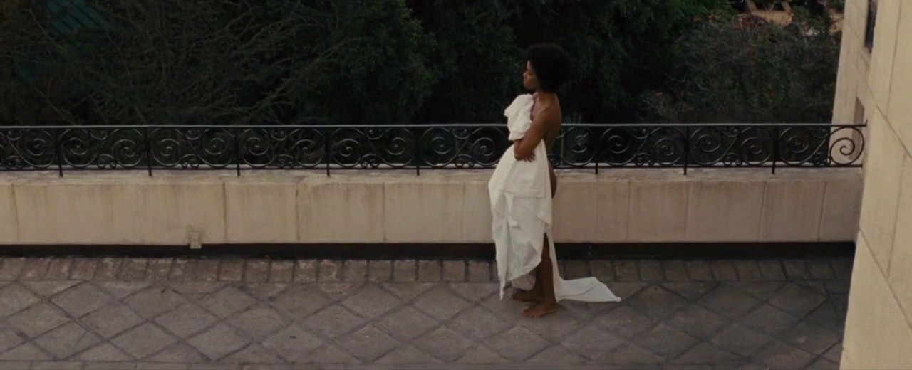 Zoe Saldaña as Nina Simone in a sheer white dress, Nina (2016)