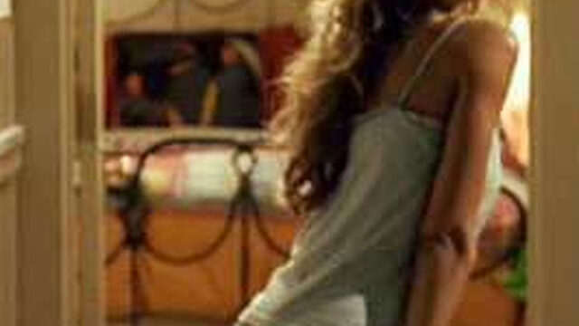 Jessica Alba looking over her shoulder in a camisole and blue lace panties in Good Luck Chuck (2007)