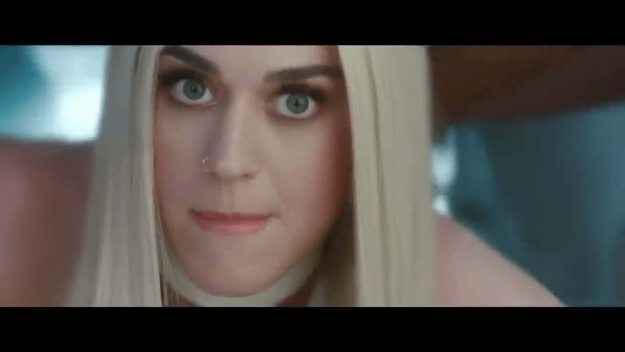 Katy Perry close-up with platinum hair and a white choker in the Bon Appetit video (2017)
