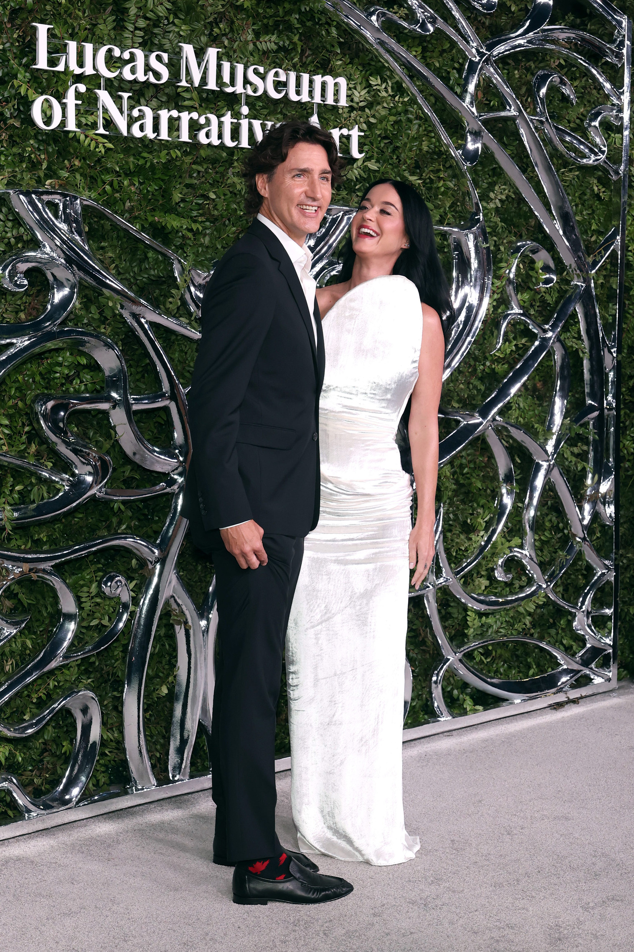 Katy Perry laughing with Justin Trudeau at the Lucas Museum of Narrative Art opening night, September 2026