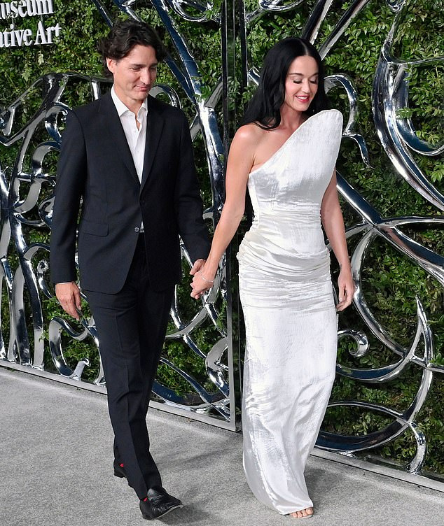 Katy Perry and Justin Trudeau walking hand in hand at the Lucas Museum of Narrative Art gala, 2026