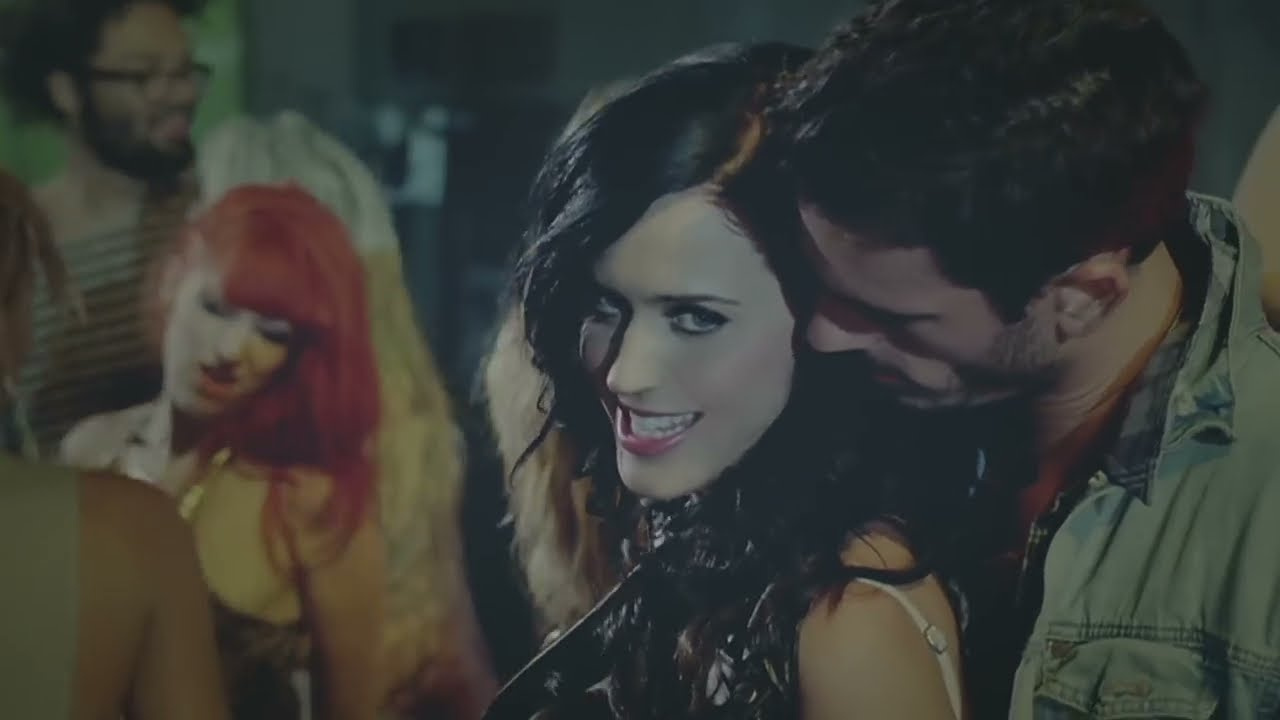 Katy Perry and Josh Kloss close together at the party in the Teenage Dream video (2010)